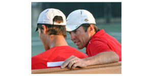 Coach Gene Carswell leans toward Tim Shulz van Endert during a 2013 match.